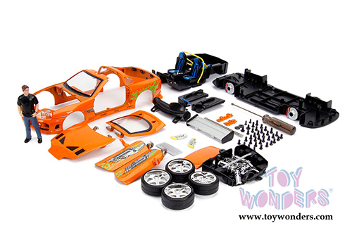 Jada Toys - Metals Die Cast - Build N Collect Model Kit | Fast & Furious Brian's Toyota Supra with Brian Figure (1/24, diecast model car, Orange) 30699