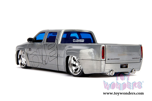 Jada Toys - 20th Anniversary | DUB City Chevrolet&reg; Silverado Dooley Pickup Truck (1999, 1/24, diecast model car, Raw Metal) 31077