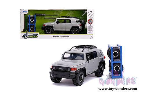 Jada Toys Just Trucks - Toyota FJ Cruiser with Roof Rack and Extra Wheels (1/24 scale diecast model car, Gray) 31557