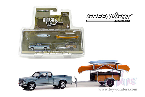 Greenlight - Hitch & Tow Series 25 | 1988 GMC&reg; S-15 Sierra Pickup Truck and Canoe Trailer with Canoe Rack, Canoe and Kayak (1/64 scale diecast model car, Blue) 32250C/24