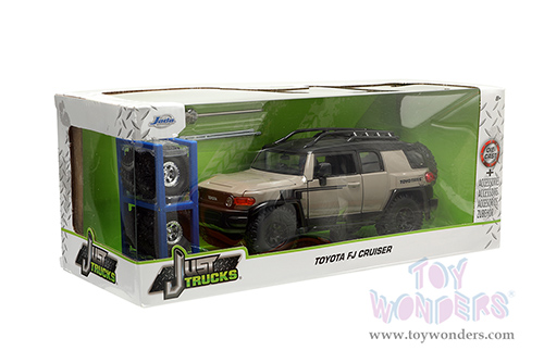 Jada Toys Just Trucks - Toyota FJ Cruiser with Roof Rack and Extra Wheels (1/24 scale diecast model car, Brown/Black) 34008