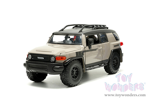 Jada Toys Just Trucks - Toyota FJ Cruiser with Roof Rack and Extra Wheels (1/24 scale diecast model car, Brown/Black) 34008