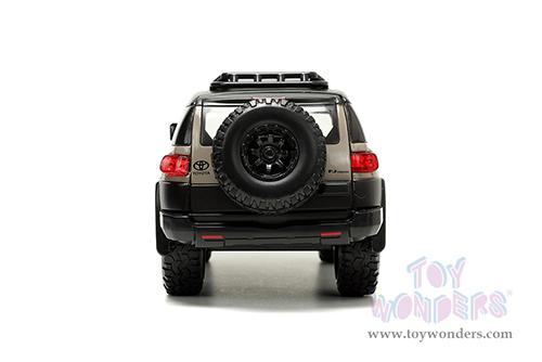 Jada Toys Just Trucks - Toyota FJ Cruiser with Roof Rack and Extra Wheels (1/24 scale diecast model car, Brown/Black) 34008