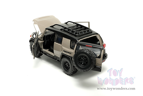 Jada Toys Just Trucks - Toyota FJ Cruiser with Roof Rack and Extra Wheels (1/24 scale diecast model car, Brown/Black) 34008