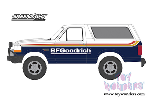 Greenlight - All Terrain Series 10 | Ford Bronco with Off–Road Parts "BFGoodrich Tires" (1992, 1/64 scale diecast model car, Blue/White) 35170E/48