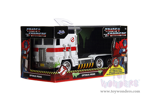 Jada Toys - Hollywood Rides | TRANSFORMERS G1 Optimus Prime® Truck Ghostbusters Ecto-1 Crossover (1/32, diecast model car, White) 35862