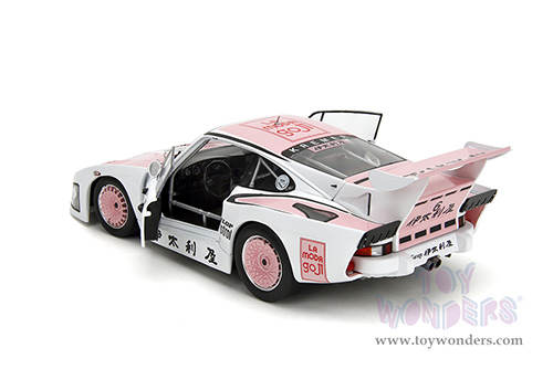 Jada Toys Pink Slips - Porsche 935 K3 #6 Bob Wollek - Henri Pescarolo Winner "Suzuka 1000KM" (1981) with Display Base (1/18 scale diecast model car, Pink/White) 36386