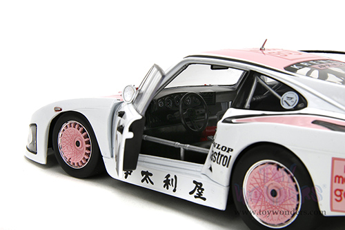 Jada Toys Pink Slips - Porsche 935 K3 #6 Bob Wollek - Henri Pescarolo Winner "Suzuka 1000KM" (1981) with Display Base (1/18 scale diecast model car, Pink/White) 36386