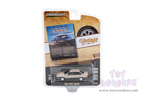Greenlight - Vintage Ad Cars Series 8 | Ford Taurus "Some Of Our Best Advertising Isn't Advertising" (1989, 1/64 scale diecast model car, Beige) 39110E/48