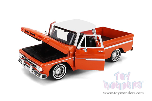 Motormax Get Low - Chevrolet® C10 Fleetside™ Pickup Truck (1966, 1/24 scale diecast model car, Orange/White) 79034WLOR