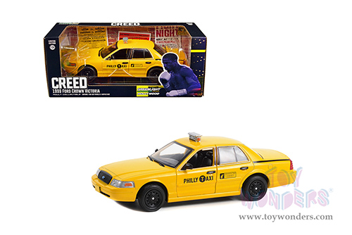 Greenlight Hollywood Series 17 | Ford Crown Victoria "Philly Taxi" "Creed" (2015 Movie) (1999, 1/24 scale diecast model car, Yellow) 84173
