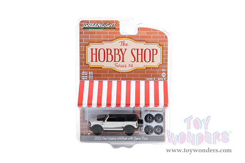 Greenlight - The Hobby Shop Series 14 | Ford Bronco Wildtrak with Spare Tires (2021, 1/64 scale diecast model car, White/Black top) 97140E/48
