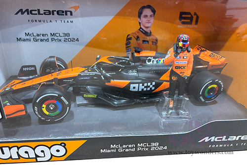Bburago Formula Racing - McLaren F1 Team #81 Oscar Piastri "OKX" Formula One F1 Miami GP (2024) with Driver Figure (1/24 scale diecast model car, Black/Orange) 18-28040/81