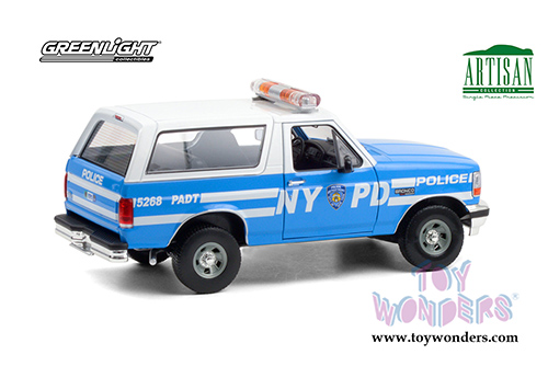 Greenlight - Artisan Ford Bronco Police Car (NYPD) New York City Police Department (1992, 1/18 scale die cast model car, Light Blue/White) 19087