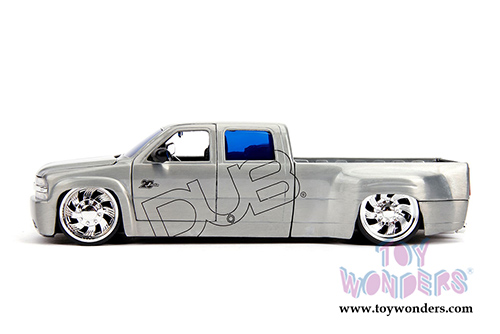 Jada Toys - 20th Anniversary | DUB City Chevrolet&reg; Silverado Dooley Pickup Truck (1999, 1/24, diecast model car, Raw Metal) 31077