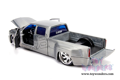 Jada Toys - 20th Anniversary | DUB City Chevrolet&reg; Silverado Dooley Pickup Truck (1999, 1/24, diecast model car, Raw Metal) 31077