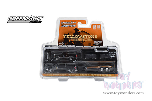 Greenlight - Hollywood Hitch & Tow Series 11 | Yellowstone - Montana Livestock Association 2018 Ford F-150 with 1992 Ford Bronco on Flatbed Trailer (1/64 scale diecast model car, Black) 31150C/24