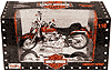 Show product details for Maisto - Harley-Davidson FLSTF Fat Boy Motorcycle (1999, 1:10, Red) 31606R