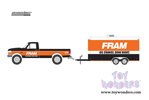 Greenlight - Hitch & Tow Series 21 | Ford F-150 XLT Pickup Truck with Enclosed Car Hauler "FRAM Oil Filters" (1994, 1/64 scale diecast model car, Black/Orange) 32210B/24