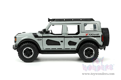 Jada Toys Just Trucks | Ford Bronco Hardtop "Own the Night" Yokohama (2021, 1/24 scale diecast model car, Gray/Black stripes) 33300