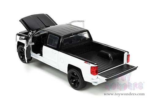 Jada Toys Just Trucks - Chevrolet&reg; Silverado&trade; Z71 Pickup Truck with Extra Wheels (2014, 1/24 scale diecast model car, White/Black) 33850