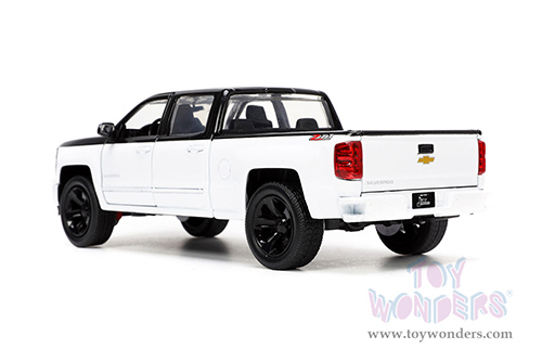 Jada Toys Just Trucks - Chevrolet&reg; Silverado&trade; Z71 Pickup Truck with Extra Wheels (2014, 1/24 scale diecast model car, White/Black) 33850