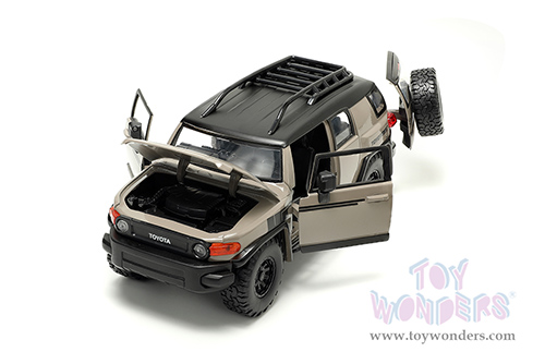 Jada Toys Just Trucks - Toyota FJ Cruiser with Roof Rack and Extra Wheels (1/24 scale diecast model car, Brown/Black) 34008