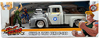Show product details for Jada Toys - Hollywood Rides | Ford F-100 Pickup Truck with Guile Diecast Figure "Street Fighter" (1956, 1/24, diecast model car, Silver) 34373