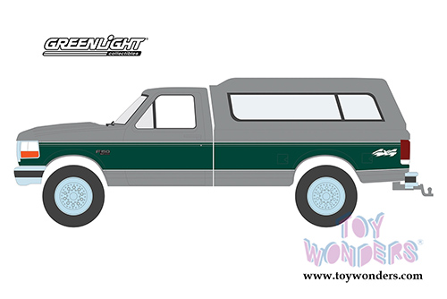 Greenlight - Blue Collar Collection Series 6 | Ford F-150 XLT Pickup Truck with Camper Shell (1996, 1/64 scale diecast model car, Silver w/Green) 35140E/48