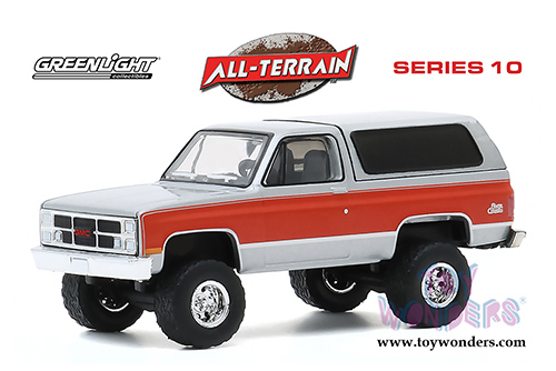 Greenlight - All Terrain Series 10 | GMC&reg; Jimmy Sierra Classic (Lifted) (1984, 1/64 scale diecast model car, Silver/Red) 35170D/48