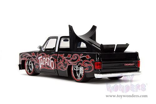 Jada Toys - Hollywood Rides | 1985 Chevrolet® C10 Pickup Truck with Charro Man figure - Tapatio Day of The Dead (1985, 1/24, diecast model car, Black with red/w White top) 35476