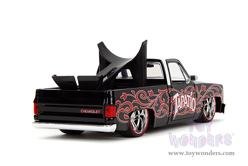 Jada Toys - Hollywood Rides | 1985 Chevrolet® C10 Pickup Truck with Charro Man figure - Tapatio Day of The Dead (1985, 1/24, diecast model car, Black with red/w White top) 35476