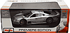 Show product details for Maisto Premiere - Mercedes Benz CLK-GTR Street Version (1:18, Silver) 36849