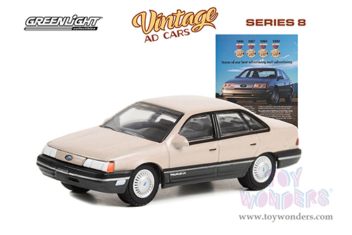 Greenlight - Vintage Ad Cars Series 8 | Ford Taurus "Some Of Our Best Advertising Isn't Advertising" (1989, 1/64 scale diecast model car, Beige) 39110E/48