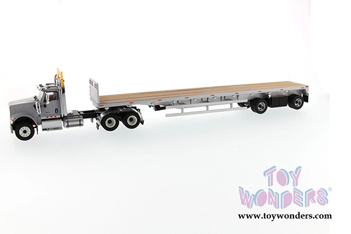 Diecast Masters - International&reg; HX520 SFFA Tandem Tractor with 53' Flat Bed Trailer (1/50 scale diecast model car, Light Gray/Silver) 71041