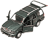 Show product details for Showcasts - Lincoln Navigator (1:24, Asstd.) 73227D