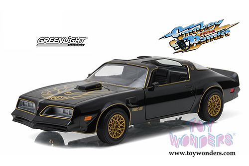 Greenlight Hollywood - Pontiac Firebird Trans Am - Smokey and the Bandit movie T Top (1977, 1/24 scale diecast model car, Black/Gold) 84013
