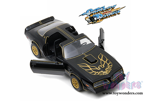 Greenlight Hollywood - Pontiac Firebird Trans Am - Smokey and the Bandit movie T Top (1977, 1/24 scale diecast model car, Black/Gold) 84013