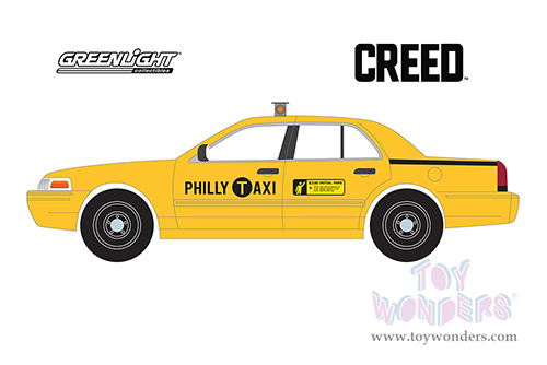 Greenlight Hollywood Series 17 | Ford Crown Victoria "Philly Taxi" "Creed" (2015 Movie) (1999, 1/24 scale diecast model car, Yellow) 84173