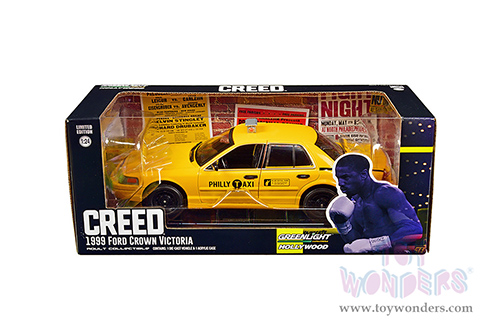 Greenlight Hollywood Series 17 | Ford Crown Victoria "Philly Taxi" "Creed" (2015 Movie) (1999, 1/24 scale diecast model car, Yellow) 84173