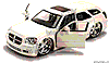 Show product details for Jada Toys Dub City - Dodge Magnum RT (2006, 1:24, Asstd.) 90297KF