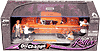 Show product details for Jada Toys Homie Rollers Oil Change - Chevy Impala Hard Top w/ Figures (1958, 1:24, Orange) 90447OR