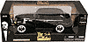 Show product details for Jada Toys The Godfather - Cadillac Fleetwood Series 75 w/ Figure (1940, 1:18, Black) 91670BK