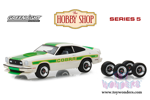 Greenlight - The Hobby Shop Series 5 | Ford Mustang II Cobra II and Spare Tires (1978, 1/64 scale diecast model car, White/Green) 97050E/48