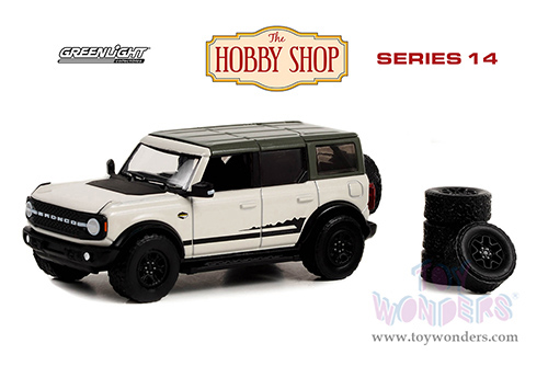 Greenlight - The Hobby Shop Series 14 | Ford Bronco Wildtrak with Spare Tires (2021, 1/64 scale diecast model car, White/Black top) 97140E/48