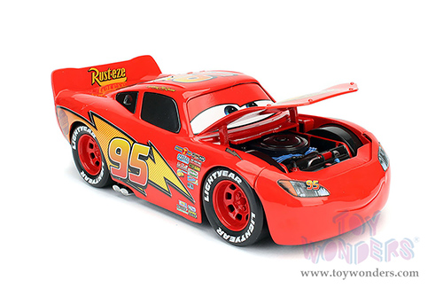 Jada Toys - Hollywood Rides | Lightning McQueen #95 Red with Extra Wheels Disney & Pixar "Cars" Movie (1/24, diecast model car, Red) 97751