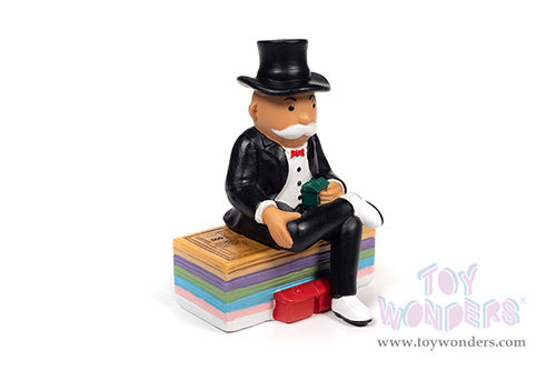 Auto World - Cadillac&reg; Series 62 Convertible with Mr. Monopoly Resin Figure (1947, 1/18 scale diecast model car, Blue/Red) AWSS136