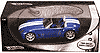 Show product details for Mattel Hot Wheels - Ford Shelby Cobra Concept Convertible (1:18, Blue w/ Stripes) H3051