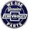 Tin Sign: We Use Genuine Chevrolet Parts Blue Round Sign RD101